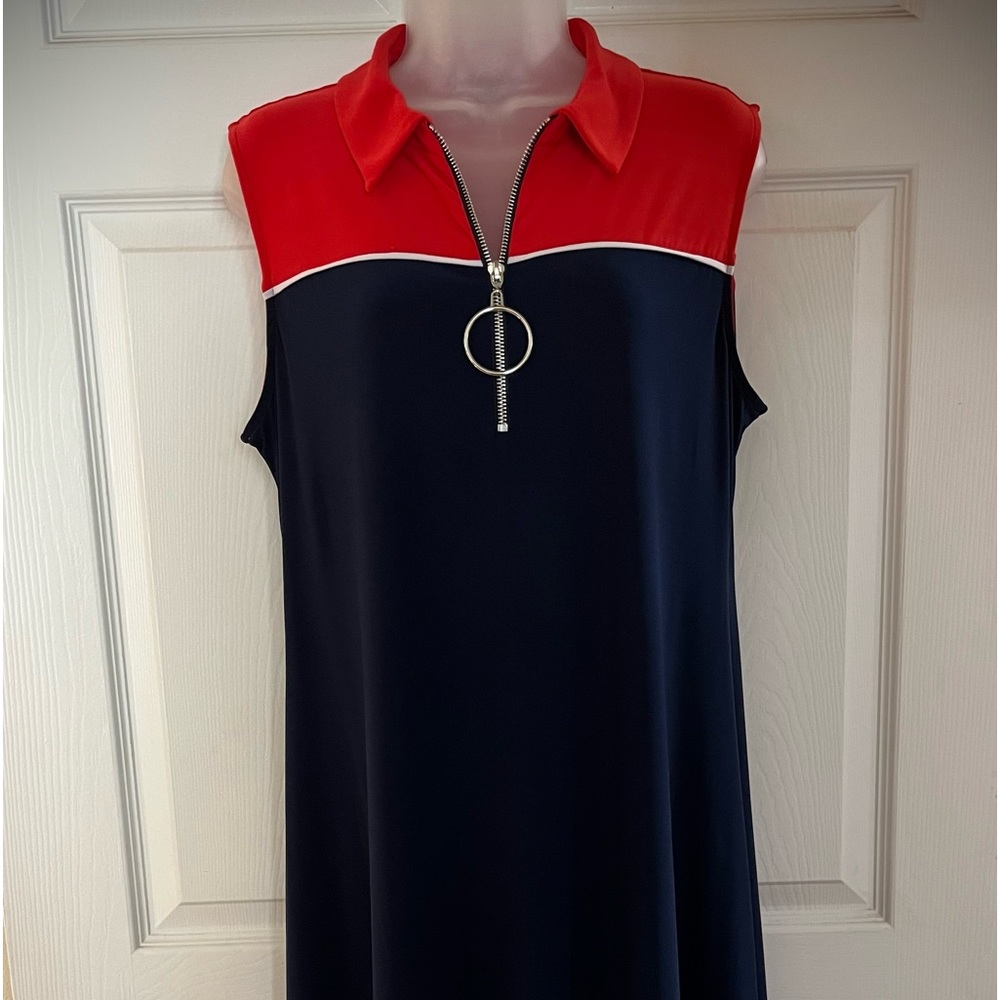 Sleeveless color block shift dress with O-ring zipper front. Size L.